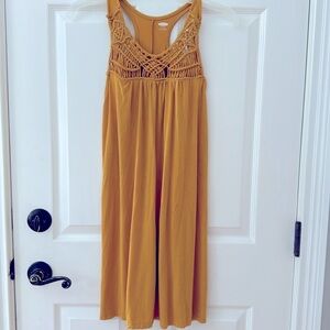 Cute gold/yellow knit tank loose fitting dress. EUC no rips tears or stains.